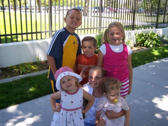 Our six children gathered outdoors around the time BYTS became our family motto.